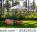 colorful bean bag seats to relax on grass outdoors. A convenient place to relax, a company or for one. 85824520