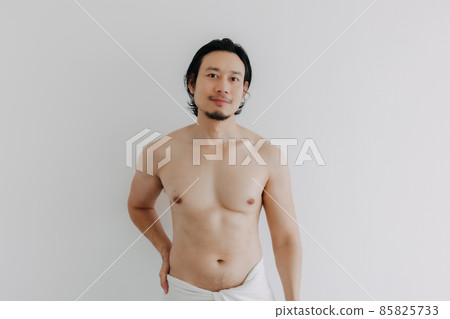 Man wearing towel in concept of beauty and healthy. 85825733