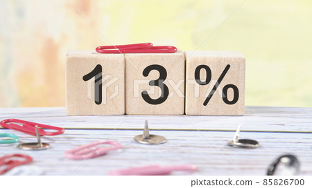 13 Percent text written on wooden cubes on a light colored background 13 Percent text written on wooden cubes on a light colored background 85826700