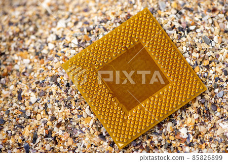 Close-up of a processor with sand in the background 85826899