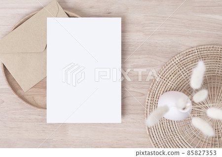 Blank paper cards, Greeting card Mockup with pampas grass on a wooden plate, beige background, Minimal beige workplace composition, flat lay, mockup Blank paper cards, Greeting card Mockup with pampas grass on a wooden plate, beige background, Minimal beige workplace composition, flat lay, mockup 85827353
