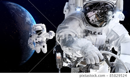 Astronaut spaceman do spacewalk while working for spaceflight mission Astronaut spaceman do spacewalk while working for spaceflight mission 85829524