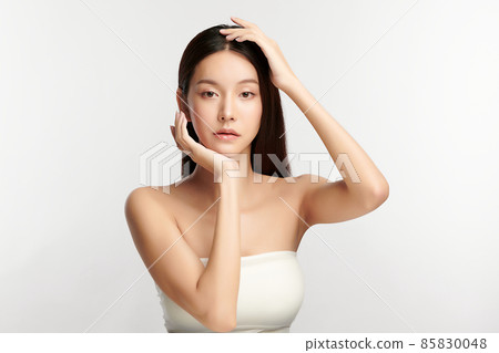 Beautiful young asian woman with clean fresh skin on white background, Face care, Facial treatment, 85830048