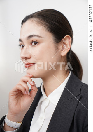 A woman in a suit A woman in a suit 85832152