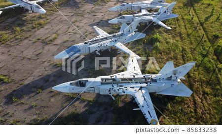 Aerial drone view flight over old rusty broken plane aircraft. 85833238