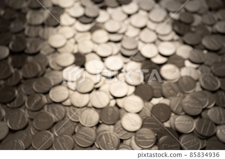 Coin hit by light Coin hit by light 85834936
