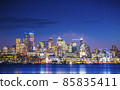 seattle city skyline at night with reflection in water. seattle,washington,usa. seattle city skyline at night with reflection in water. seattle,washington,usa. 85835411