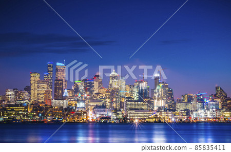 seattle city skyline at night with reflection in water. seattle,washington,usa. 85835411