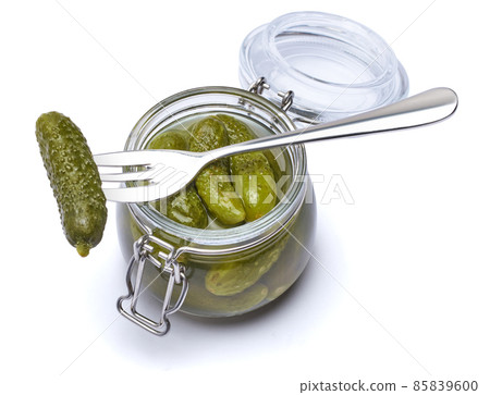 Can of Tasty green cornichons isolated on a white background 85839600