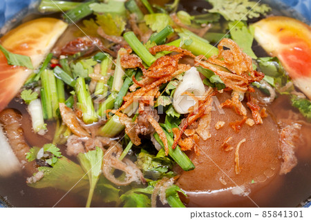 Oxtail soup, traditional muslim food with ox tail puree with spices Oxtail soup, traditional muslim food with ox tail puree with spices 85841301