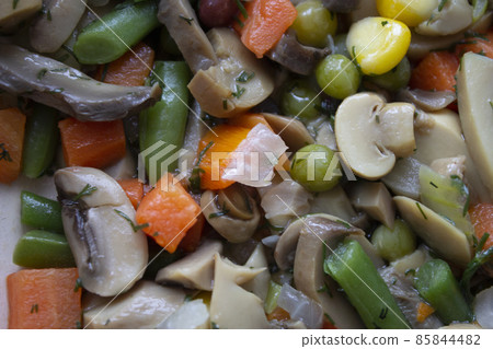 mushrooms and vegetables cooked in a frying pan mushrooms and vegetables cooked in a frying pan 85844482