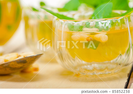 Arab traditional mint and pine nuts tea Arab traditional mint and pine nuts tea 85852238