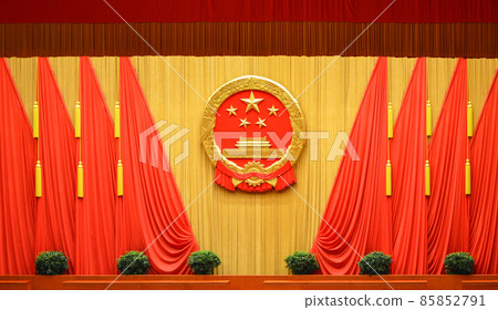 National emblem of the People's Republic of China and Red flags at the Great Hall of the People in Beijing, China on March 13, 2014 85852791