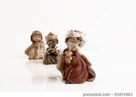 The Three Kings carrying their gifts adoring the Child Jesus. Epiphany day concept. The Three Kings carrying their gifts adoring the Child Jesus. Epiphany day concept. 85854861