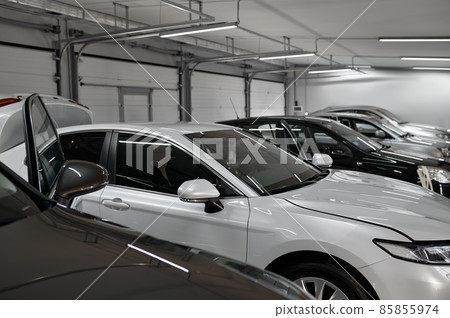 Different painted car drying in repair shop Different painted car drying in repair shop 85855974