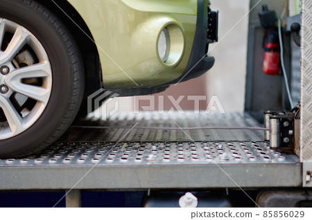 Closeup of car attached to tow rope Closeup of car attached to tow rope 85856029