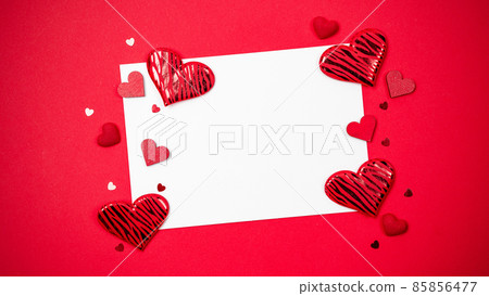 Valentines day heart. Red heart, romantic gift on love red with copy space. Valentine decoration for flat lay background. Valentines day heart. Red heart, romantic gift on love red with copy space. Valentine decoration for flat lay background. 85856477