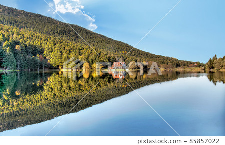 Panoramic view of Abant Lake with a wooden lake house in Abant, Golcuk, Bolu, Turkey Panoramic view of Abant Lake with a wooden lake house in Abant, Golcuk, Bolu, Turkey 85857022