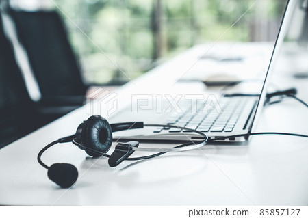 Headset and customer support equipment at call center ready for actively service 85857127