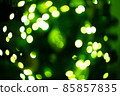 Bokeh green on a black background. Blur and bokeh abstract , vibrant colors and textured. Good wallpapers .Copy space. 85857835
