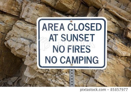 area closed at sunset - warning sign area closed at sunset - warning sign 85857977