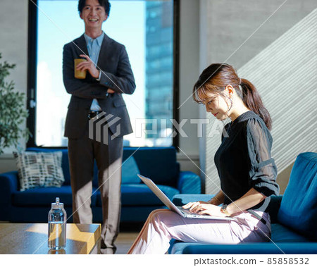 Men and women chatting in a sunny office 9 Men and women chatting in a sunny office 9 85858532