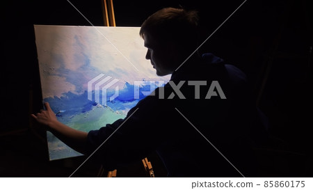 Artist copyist paint seascape with ship in ocean. Craftsman decorator draw as boat sail on blue sea with acrylic oil color. 85860175