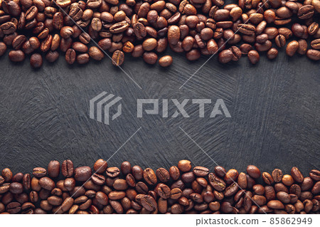 Coffee beans on dark background Coffee beans on dark background 85862949