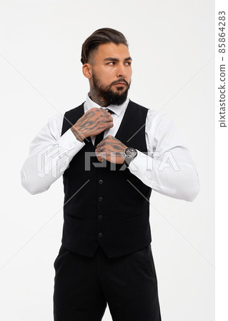 Tattooed male model in formal clothes with tie Tattooed male model in formal clothes with tie 85864283