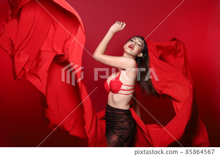Young Slim Transgender Asian Woman wears red bikini bra dress, Beautiful Girl fluttering fabric Young Slim Transgender Asian Woman wears red bikini bra dress, Beautiful Girl fluttering fabric 85864567