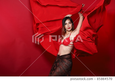 Young Slim Transgender Asian Woman wears red bikini bra dress, Beautiful Girl fluttering fabric Young Slim Transgender Asian Woman wears red bikini bra dress, Beautiful Girl fluttering fabric 85864570