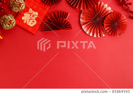 Chinese new year festival decoration with red envelopes and red Chinese folded fans on red background. Chinese new year festival decoration with red envelopes and red Chinese folded fans on red background. 85864593