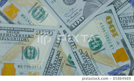 Many dollar are arranged around the edges of the image as a fram Many dollar are arranged around the edges of the image as a fram 85864989