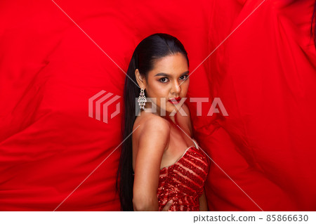 Portrait of Young Slim Idian Woman wears white sequin Evening Ball Gown long dress, Beautiful india Portrait of Young Slim Idian Woman wears white sequin Evening Ball Gown long dress, Beautiful india 85866630