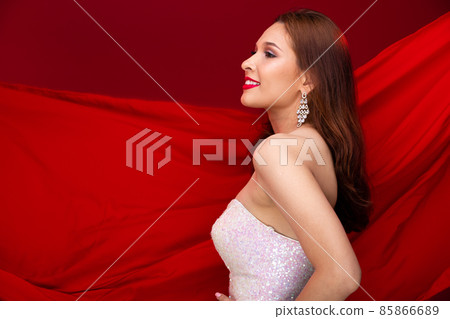 Young Slim caucasian Woman wears white sequin Evening Ball Gown long dress Young Slim caucasian Woman wears white sequin Evening Ball Gown long dress 85866689
