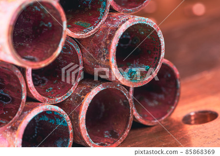 Old copper pipe with corrosion oxidation Old copper pipe with corrosion oxidation 85868369