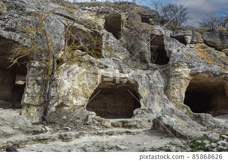 Caves in the rock Cave city Chufut-Kale in Bakhchysarai, Crimea Caves in the rock Cave city Chufut-Kale in Bakhchysarai, Crimea 85868626