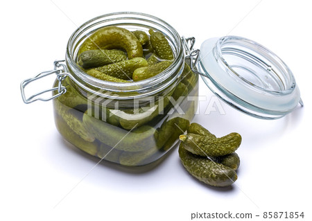 Can of Tasty green cornichons isolated on a white background 85871854
