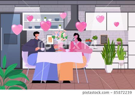 loving couple celebrating happy valentines day man woman in love drinking coffee at home 85872239