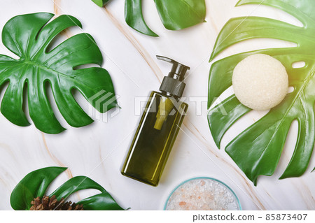 Natural skincare beauty product, Cosmetic bottle containers packaging with green nature leaves, Blank label for organic spa branding mock-up,Herbal healthy skin care. 85873407