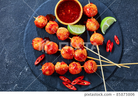 Luk Chin Ping, thai meatball skewers, top view Luk Chin Ping, thai meatball skewers, top view 85873806
