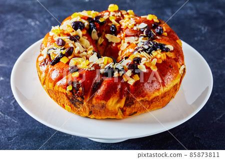 sweet bread wreath sprinkled with fruits and nuts sweet bread wreath sprinkled with fruits and nuts 85873811