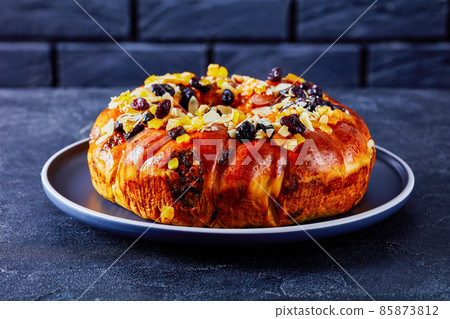 sweet bread wreath sprinkled with fruits and nuts sweet bread wreath sprinkled with fruits and nuts 85873812