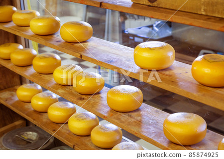 Holland cheese rounds at traditional market 85874925