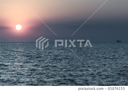 Beautiful sunset over a calm sea. 85876155