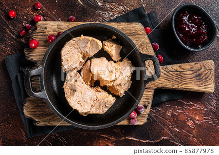 Franch Foie gras duck liver pate with lingonberry marmalade. Dark background. Top view Franch Foie gras duck liver pate with lingonberry marmalade. Dark background. Top view 85877978