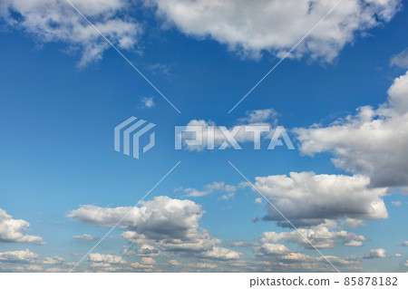 Small white clouds gradually fill the space in the blue sky. Small white clouds gradually fill the space in the blue sky. 85878182