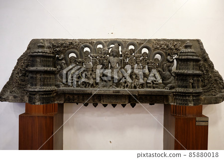 Ornamental stone carved lintel relief showing trinity of gods - Brahma, Vishnu and Shiva, in the National Museum of India in New Delhi 85880018