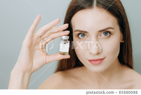woman insistently approves buy bottle medicine cosmetic woman insistently approves buy bottle medicine cosmetic 85880098
