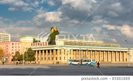Kim Il-sung Square and government buildings decorated with flags and revolutionary slogans in Pyongyang, North Korea 85881889